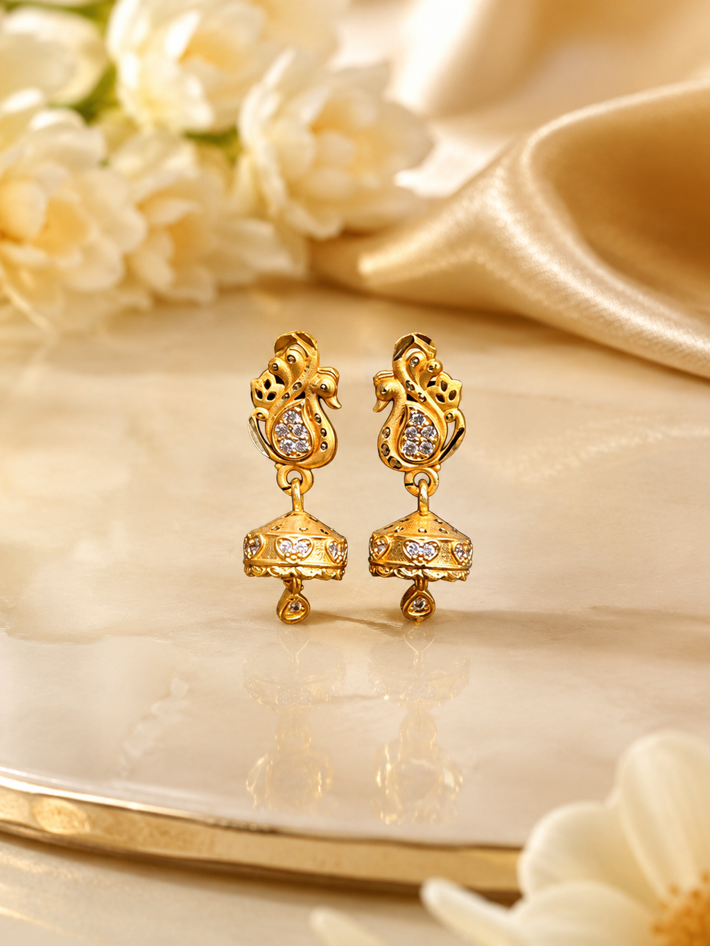 Golden Peacock Design Jhumka Earrings with Sparkling Stone Work