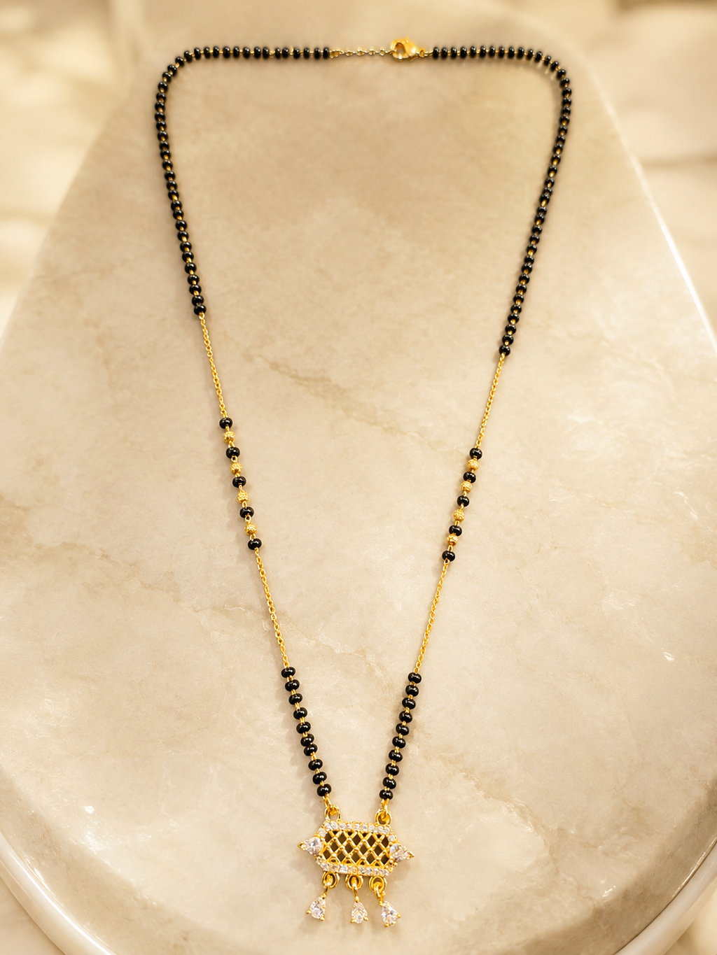 Elegant Gold-Plated CZ Geometric Pendant Mangalsutra for Women | Black Bead Chain Necklace | Traditional Daily Wear Jewellery