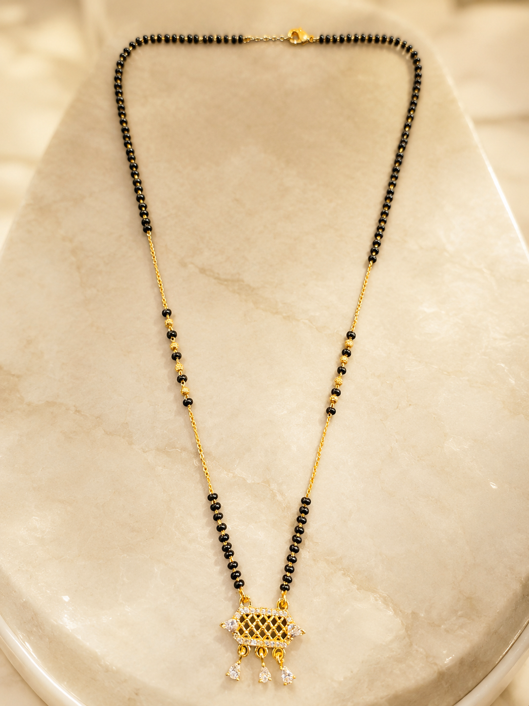 Elegant Gold-Plated CZ Geometric Pendant Mangalsutra for Women | Black Bead Chain Necklace | Traditional Daily Wear Jewellery