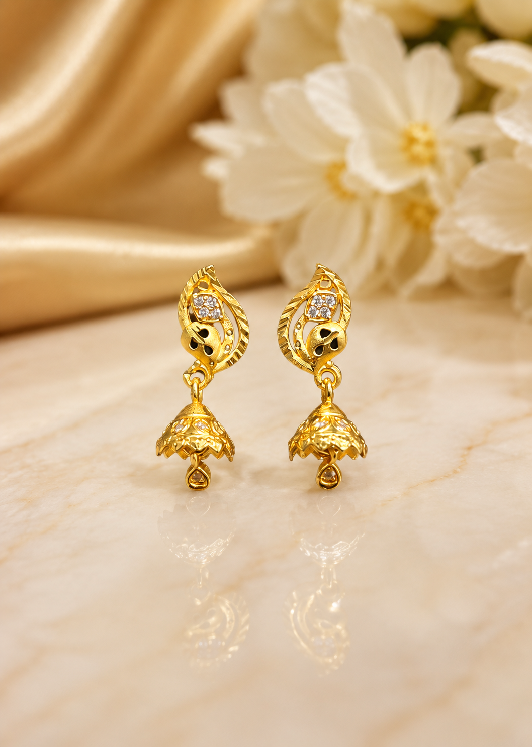 Golden Peacock Leaf Jhumka Earrings with Sparkling Stone Detail