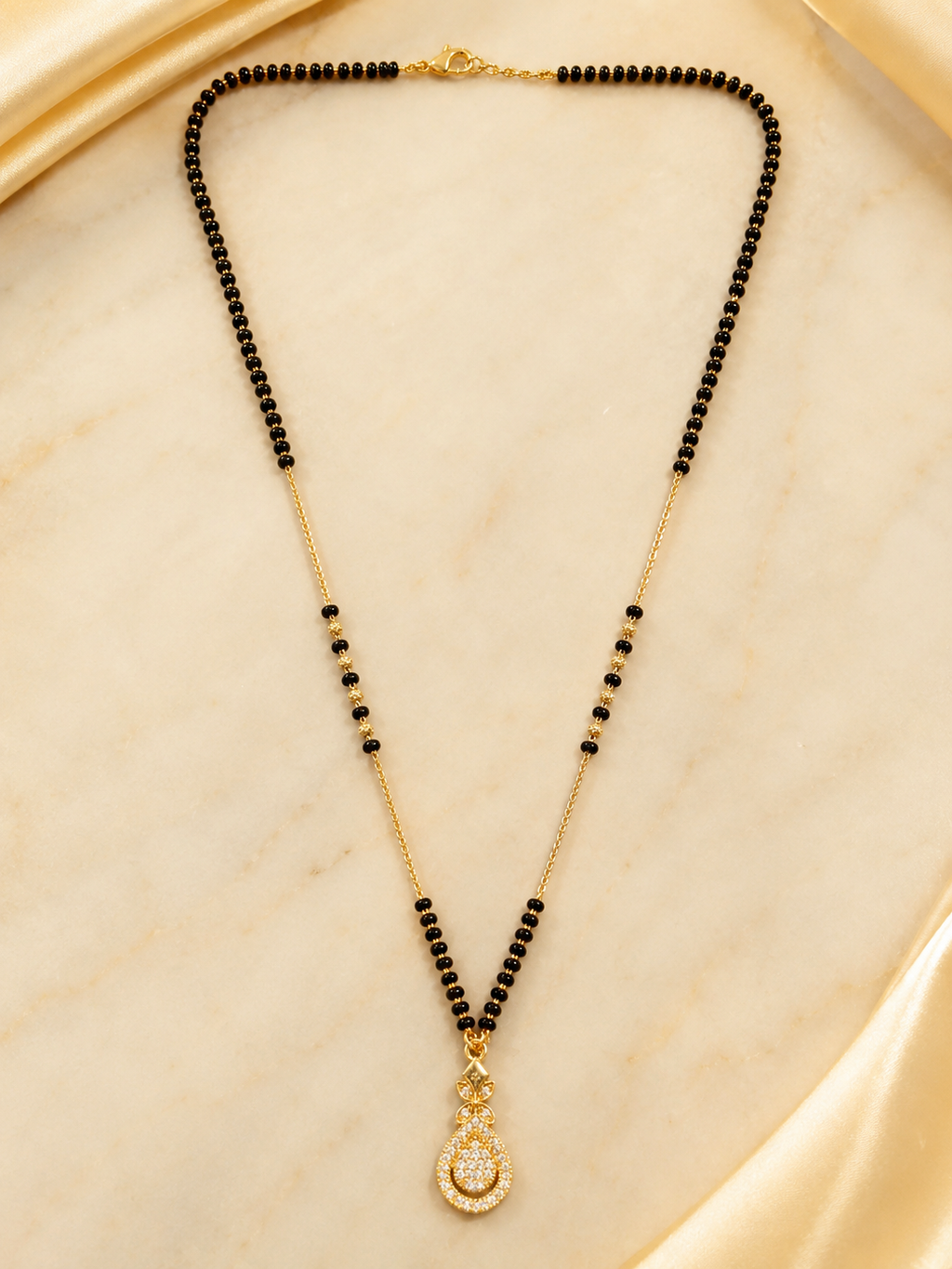 Elegant Gold-Plated CZ Teardrop Mangalsutra for Women | Traditional Black Bead Chain Necklace | Daily Wear & Bridal Jewellery