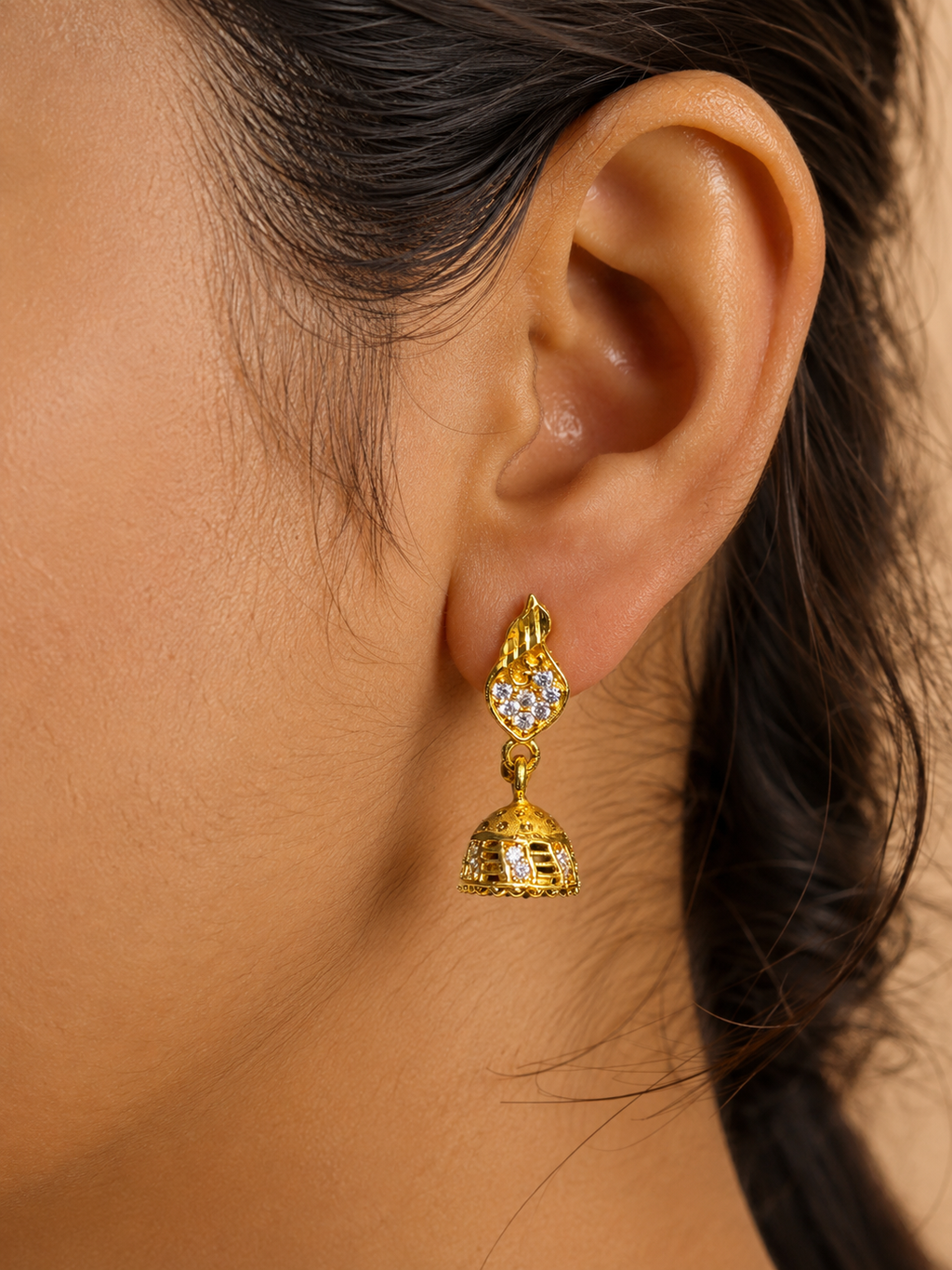 Gold-Plated Leaf Motif AD Stone Jhumka Earrings for Women
