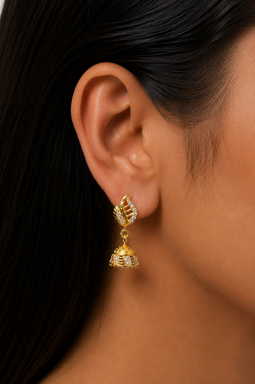 Elegant Leaf Design Gold-Plated Jhumka Earrings with Crystal Stones