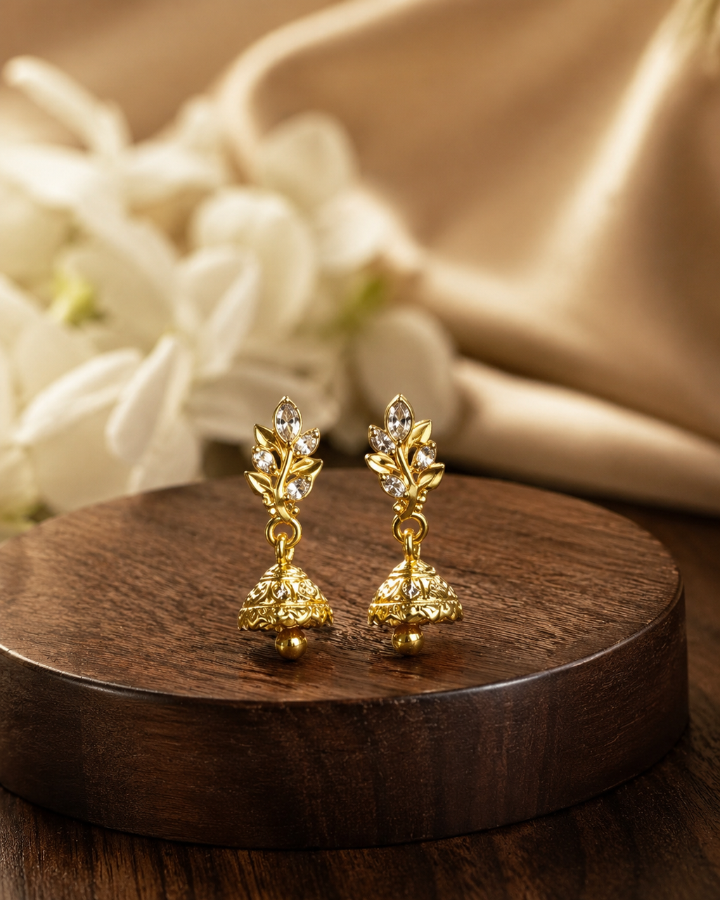 Elegant Gold-Plated Floral Jhumka Earrings with CZ Stones