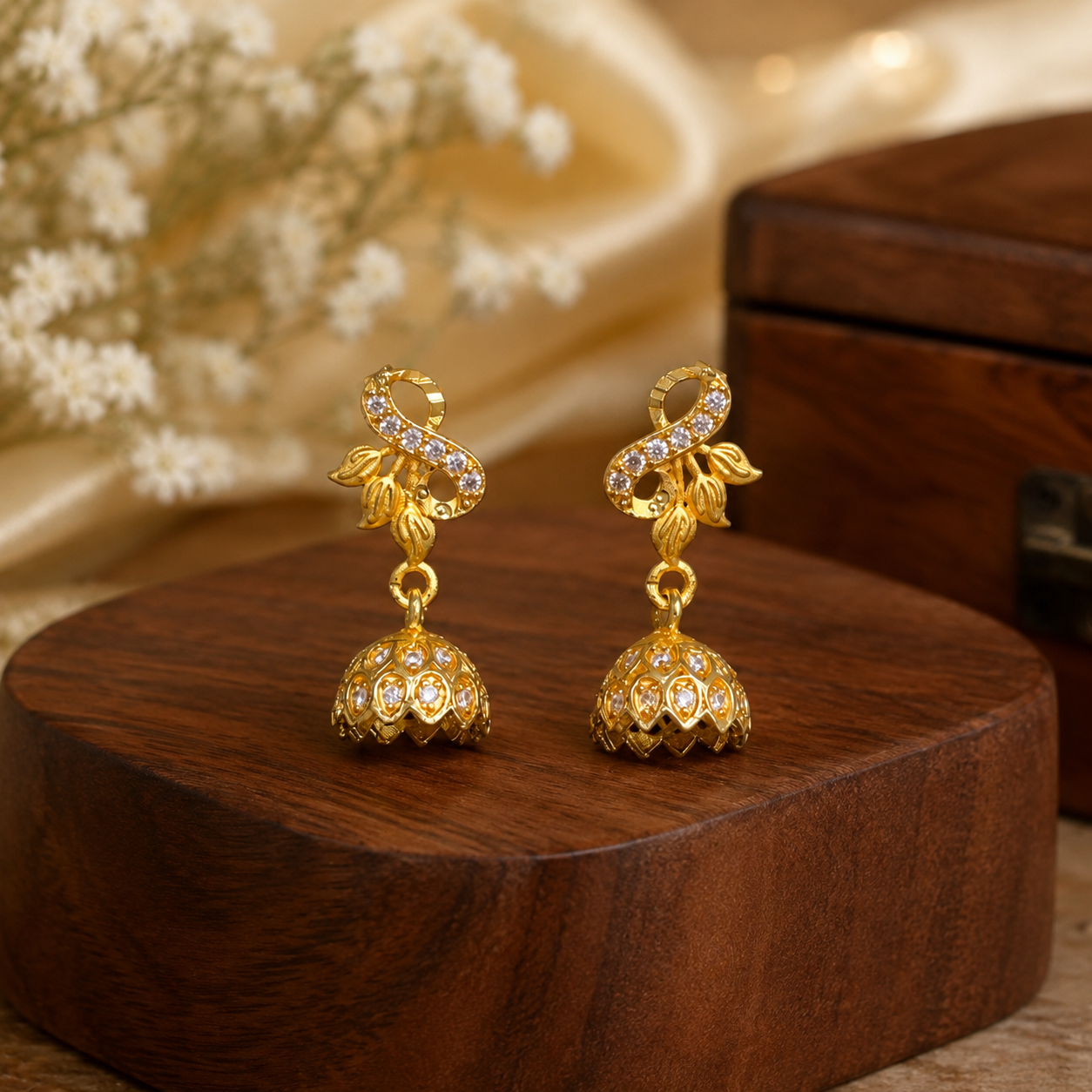 Gold-Plated Infinity Leaf AD Stone Jhumka Earrings for Women