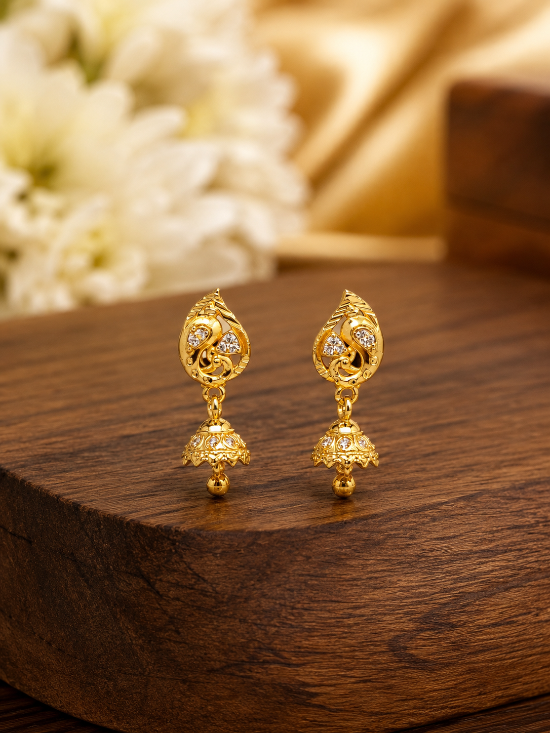 Golden Peacock Leaf Drop Jhumka Earrings with Sparkling Stone Work