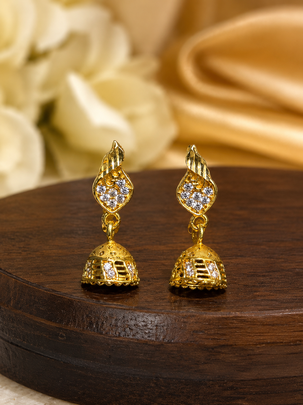 Gold-Plated Leaf Motif AD Stone Jhumka Earrings for Women