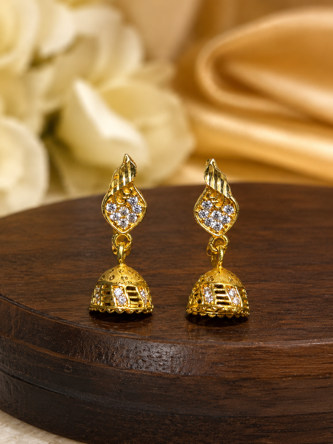 Gold-Plated Leaf Motif AD Stone Jhumka Earrings for Women