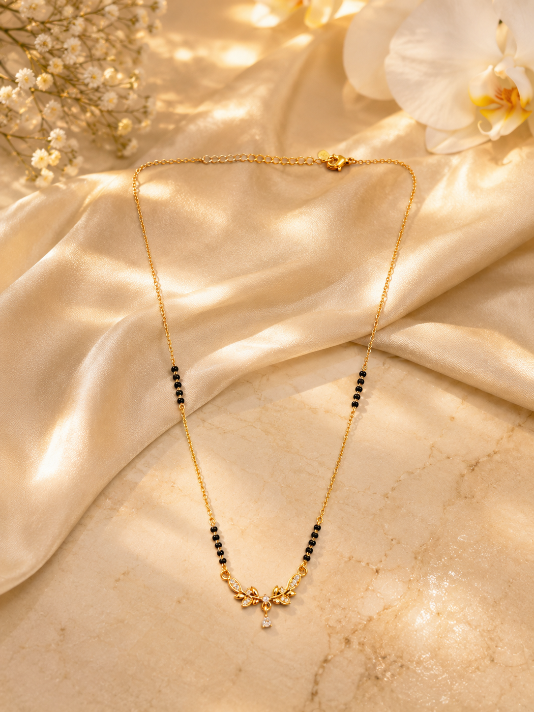 Elegant Gold-Plated CZ Leaf Vine Mangalsutra for Women | Minimal Black Bead Chain | Traditional & Daily Wear Necklace