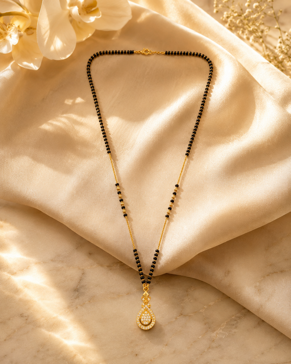 Elegant Gold-Plated CZ Teardrop Mangalsutra for Women | Traditional Black Bead Chain Necklace | Daily Wear & Bridal Jewellery